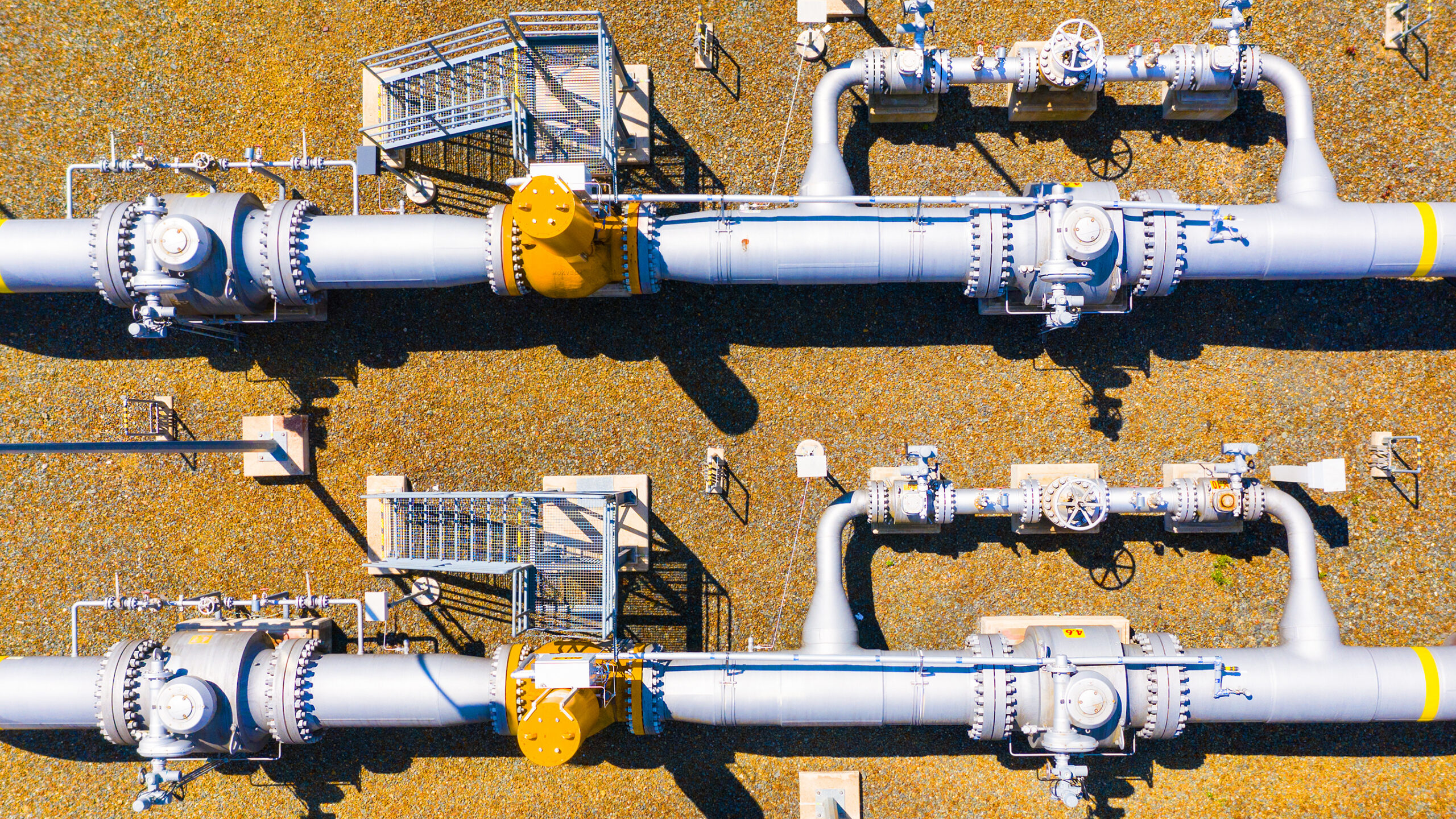 Natural gas pipeline. One part of Nord Stream pipeline from Russia to European Union. High pressure pipes on a hot summer day.